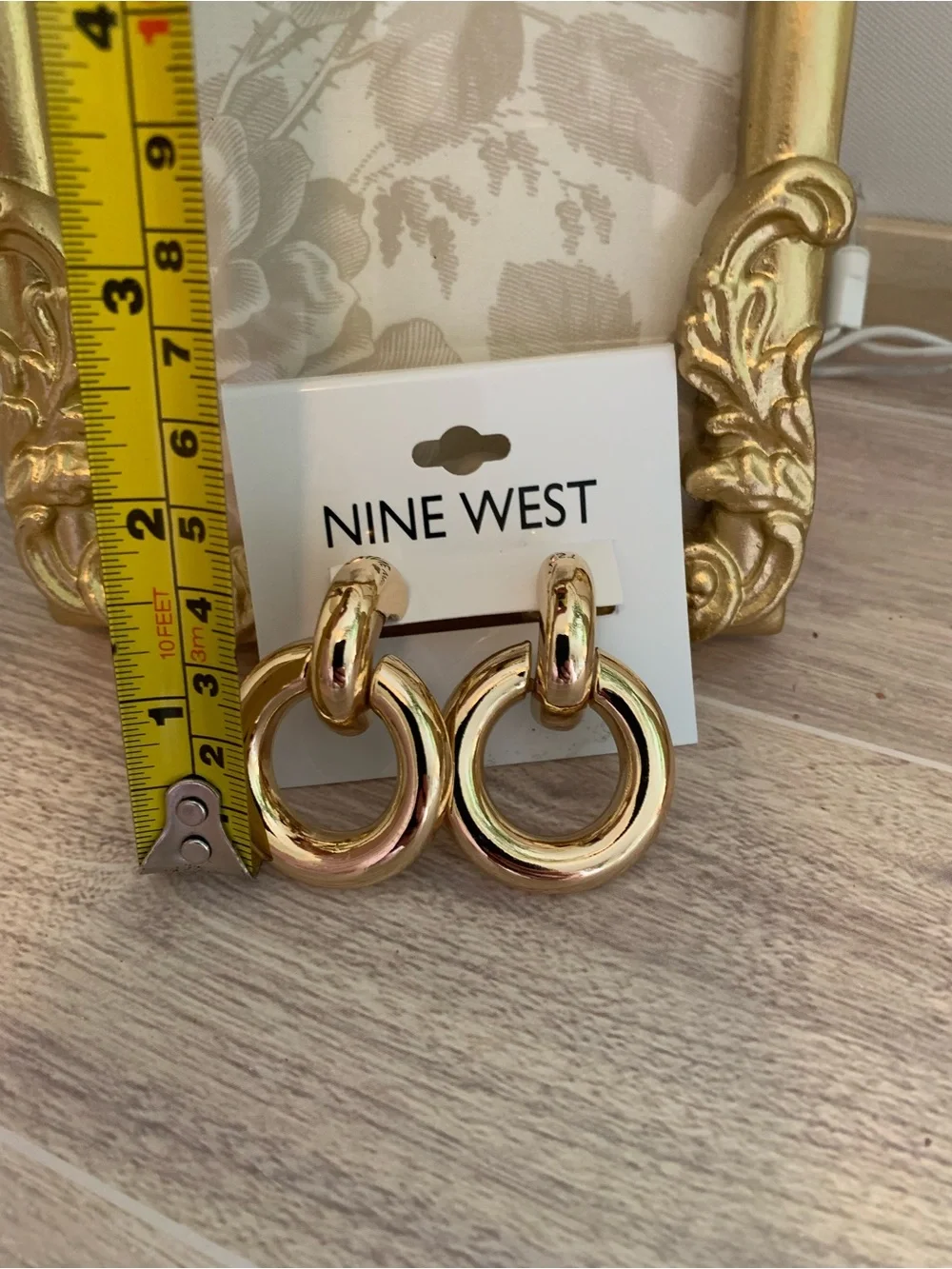 Nine West Shiny Gold Interlocking Hoop Earrings - Picture 2 of 4
